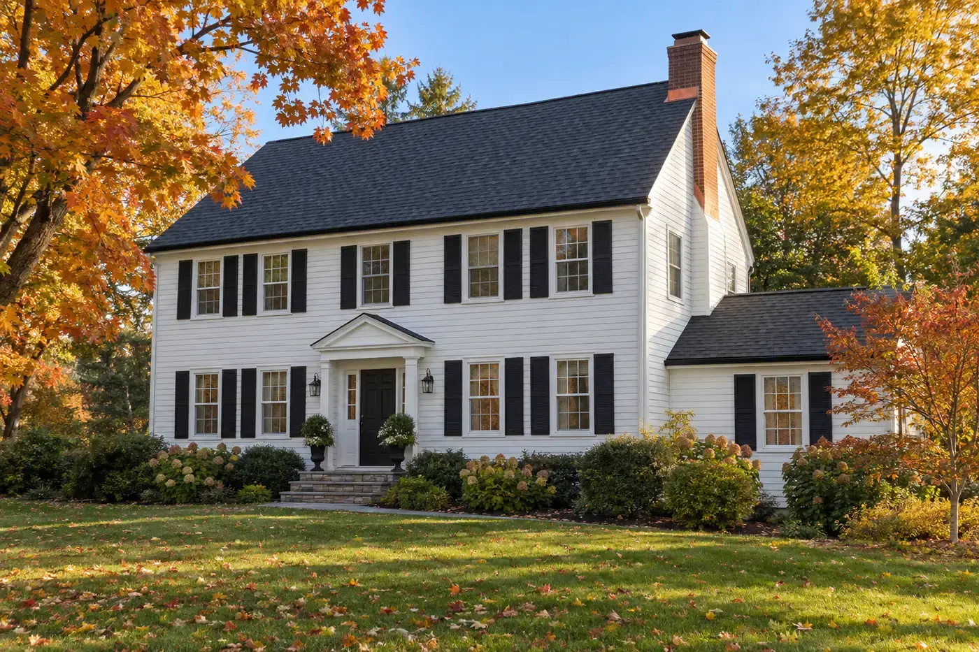Architectural shingle roof on a clapboard colonial